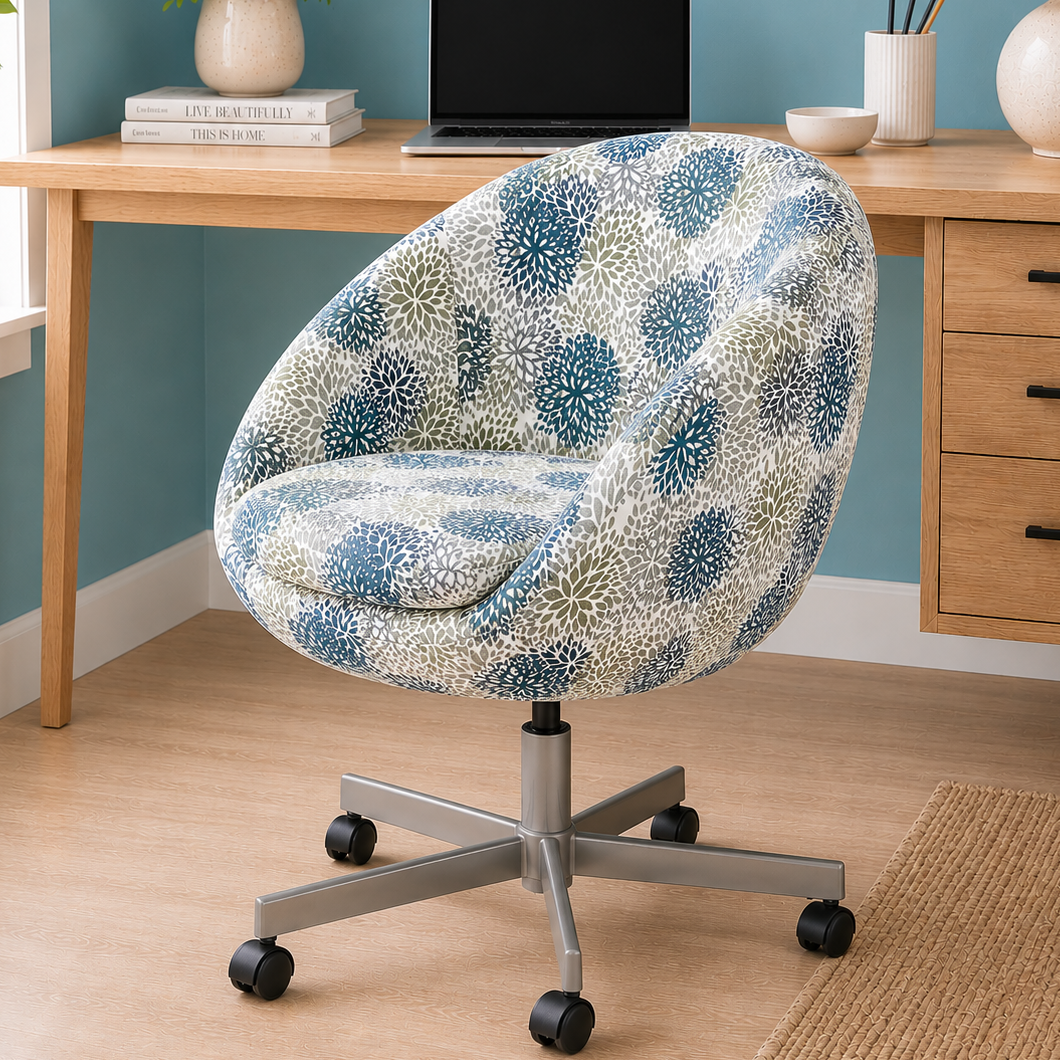 Decorative office chair with blue and white pattern in front of a wooden desk.