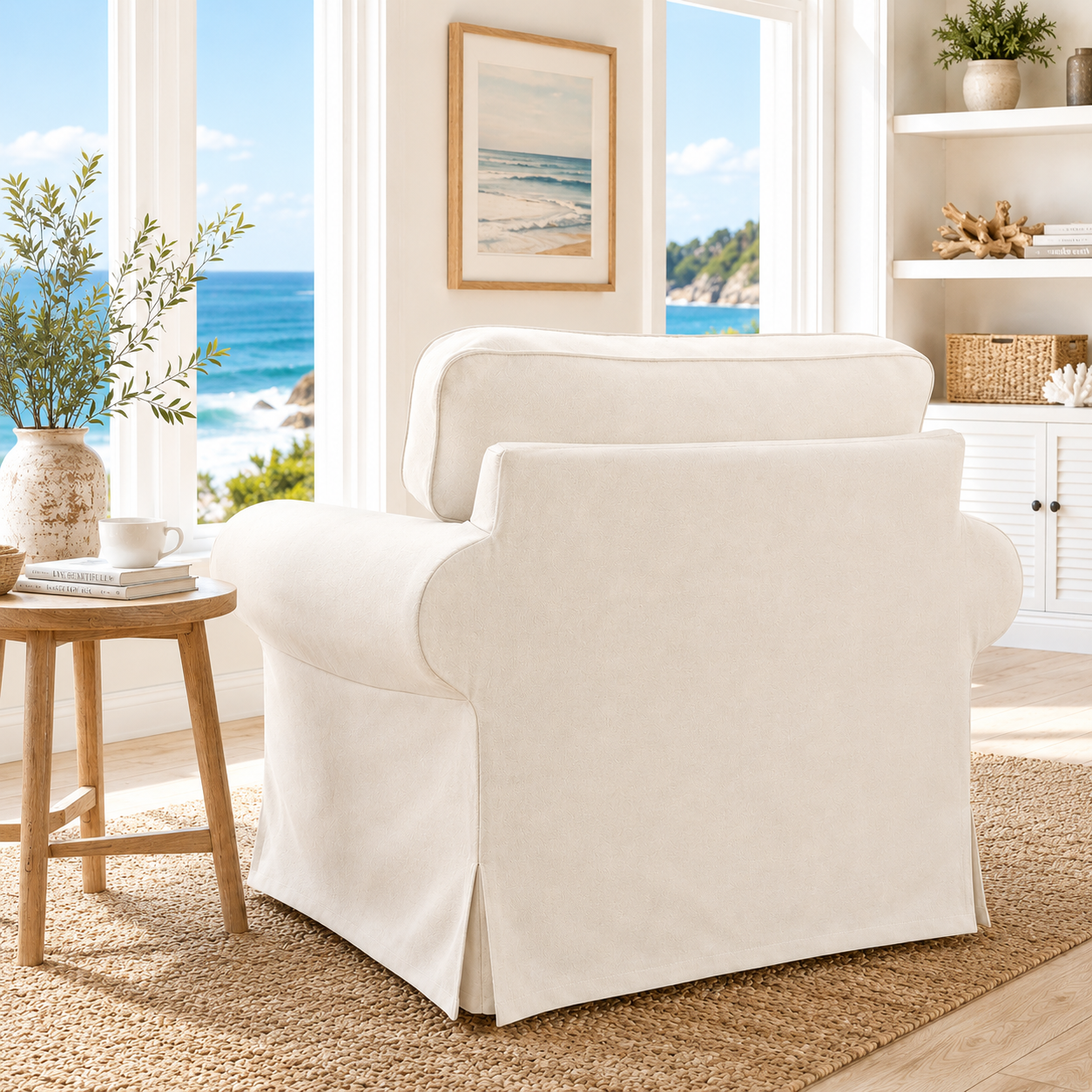 White armchair in a bright living room with ocean view