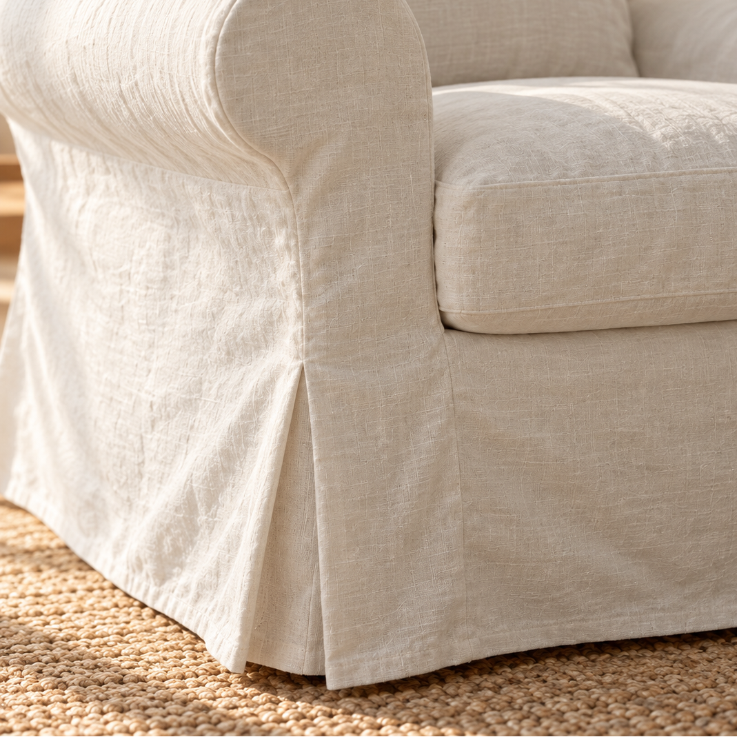 EKTORP Natural Linen slipcover close-up of seat cushion and skirt pleat