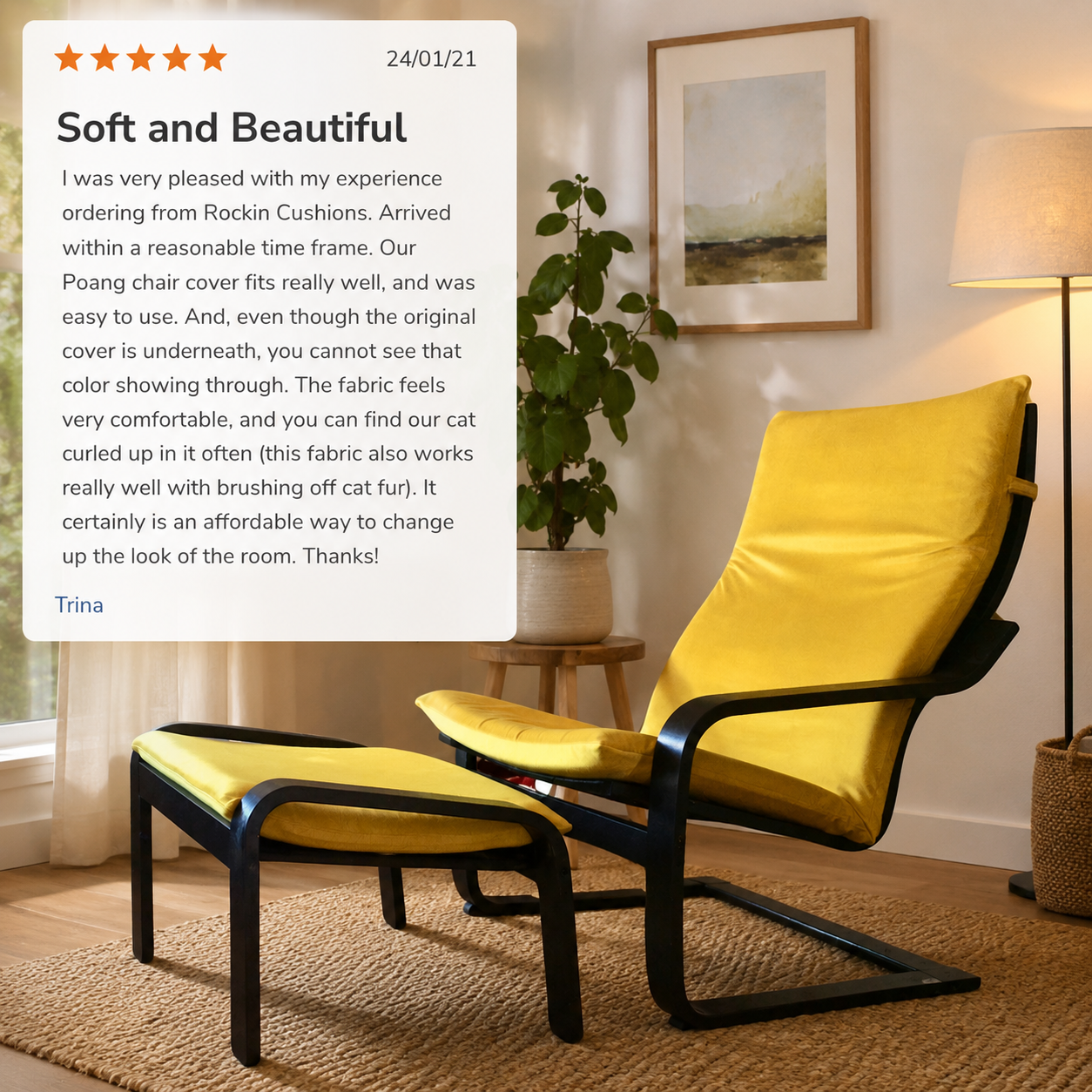 Yellow chair with black frame in a room with a plant and lamp.